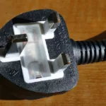 image shows british plug made from ebonite tested to bs en iso 868